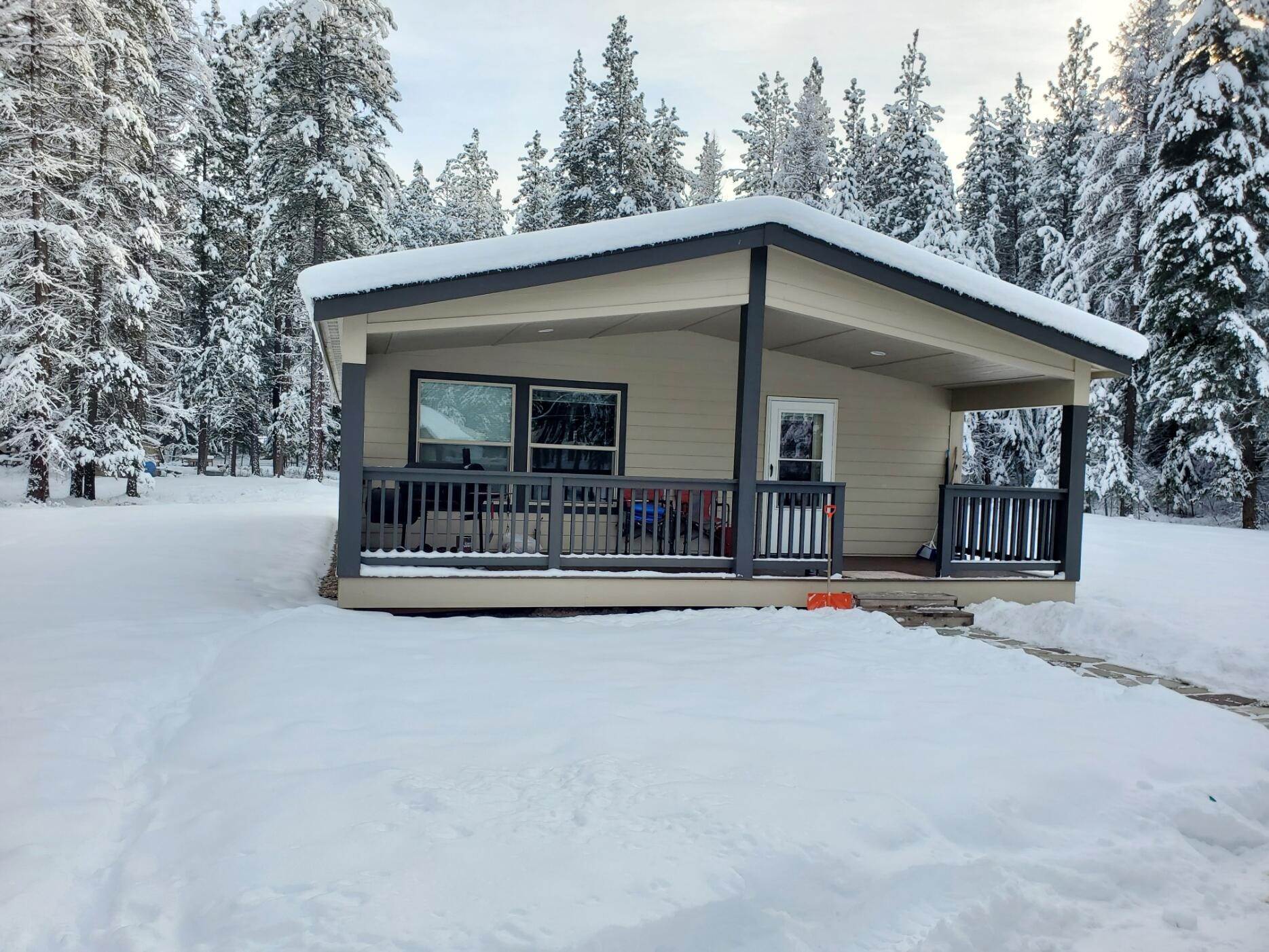 15. Single Family Homes for Sale at 19805 West Ninemile Road Huson, Montana 59846 United States